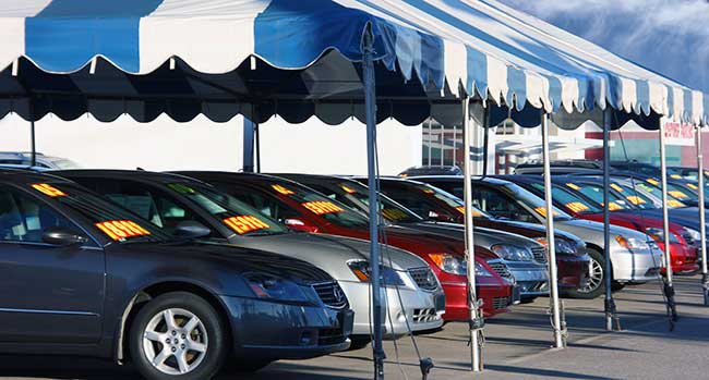 how much do car dealers pay for new cars